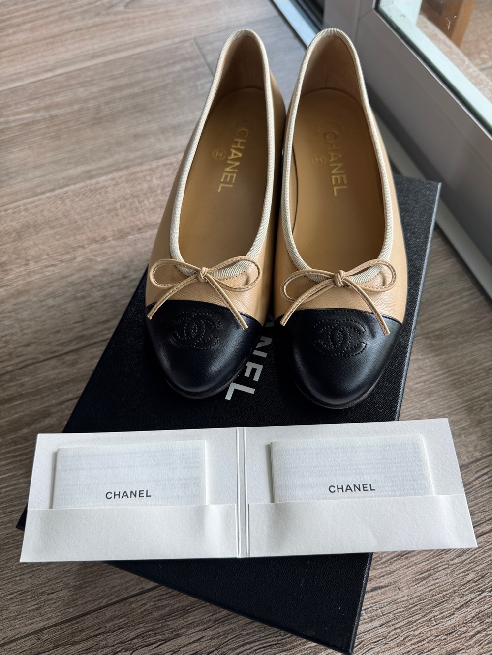 CHANEL Beige and Black Two-Tone Cap-Toe Ballet Flats - Picture 16 of 16